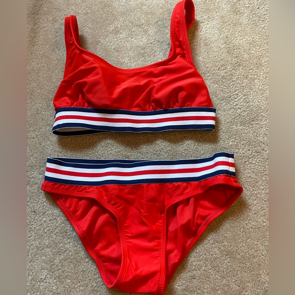 I am selling a bathing suit set from target. They are both a size small